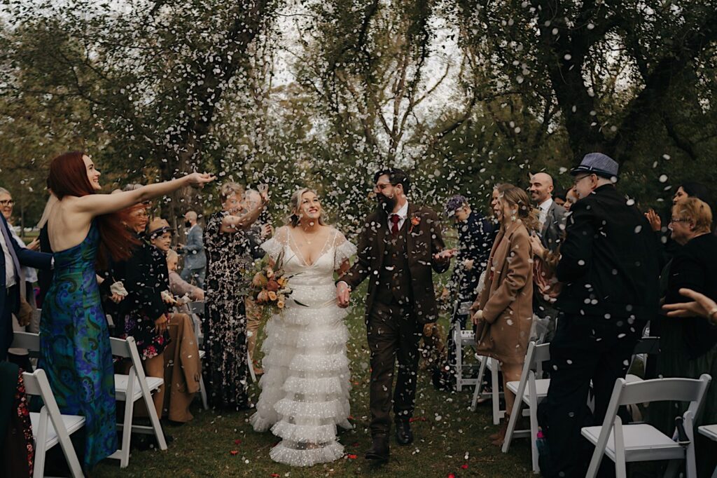 049_confetti toss at wedding in Edinburgh Gardens Fitzroy