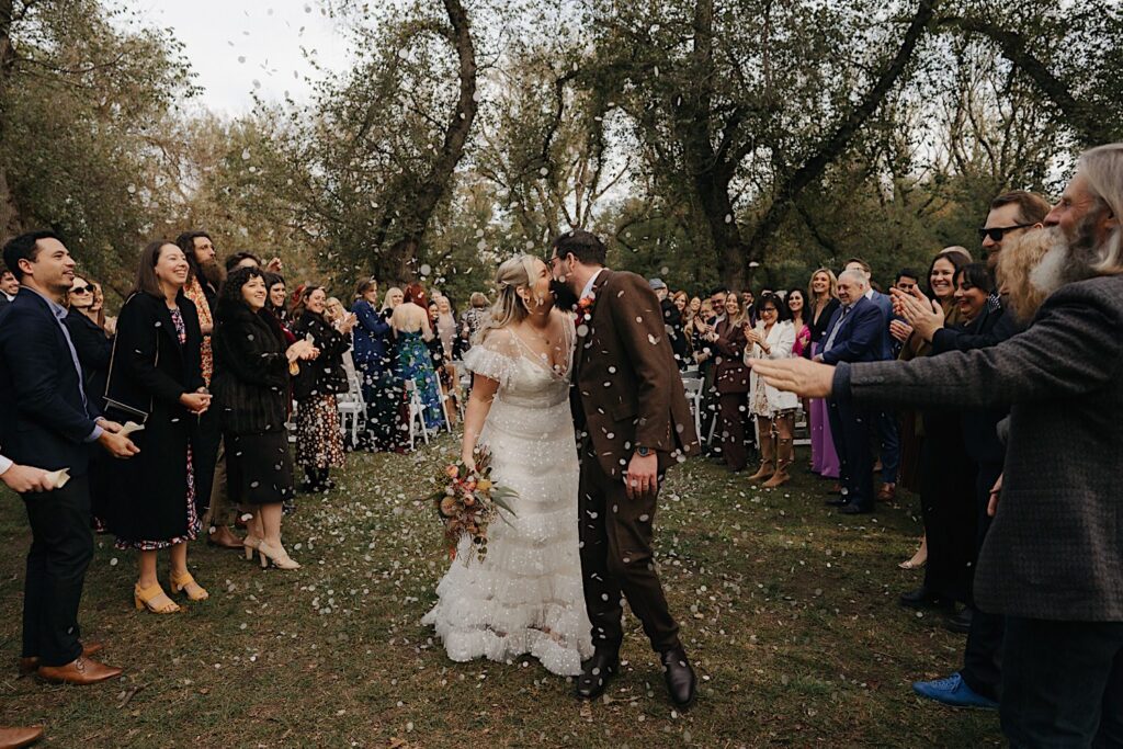 051_confetti toss at wedding in Edinburgh Gardens Fitzroy