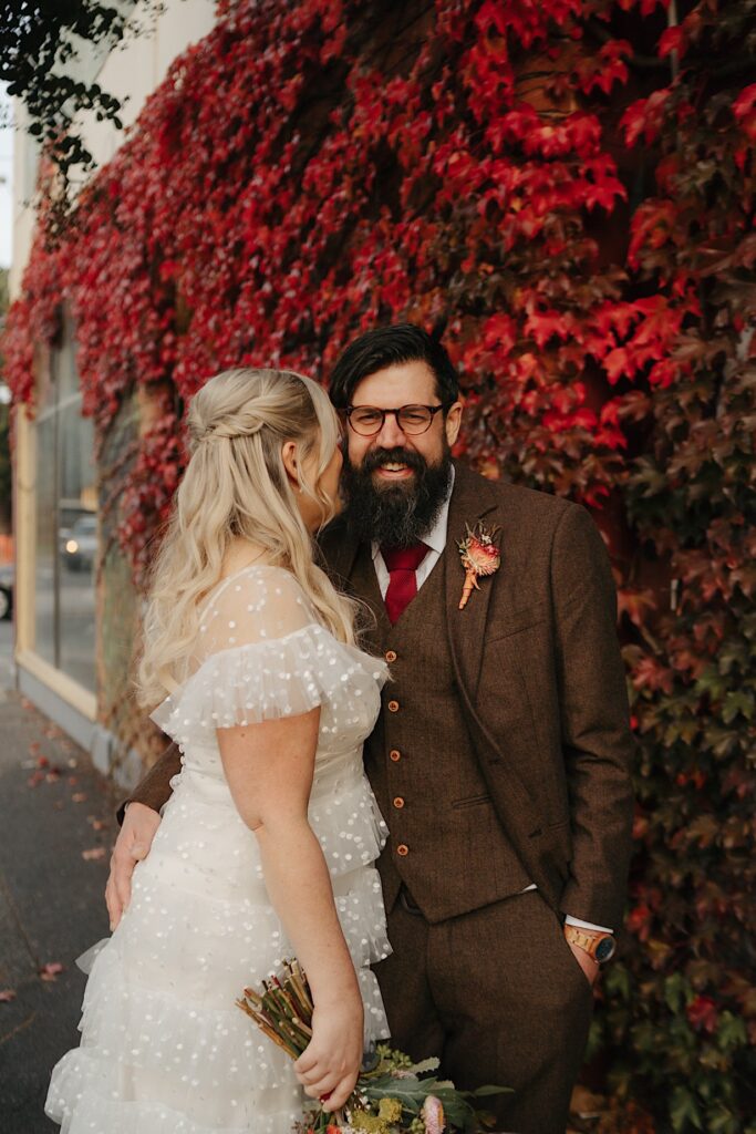 075_bride and groom in front of autumn wall fitzroy melbourne