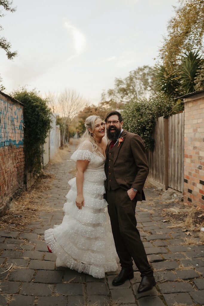 084_couple having portraits in laneway before fitzroy pinnacle wedding