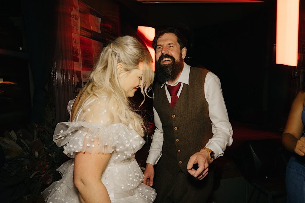 fitzroy pinnacle wedding Bride and groom dancing at their fitzroy pub wedding