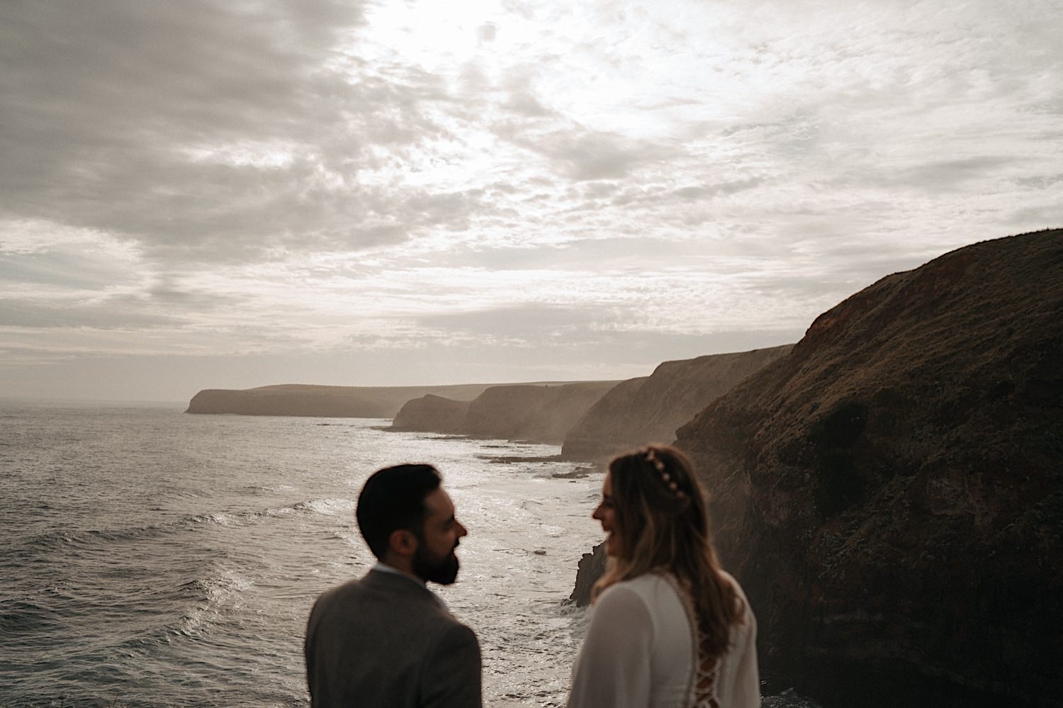 61_Flinders Elopement Mornington Peninsula Wedding Bride and Groom standing on the cliffs after their Mornington Peninsula wedding