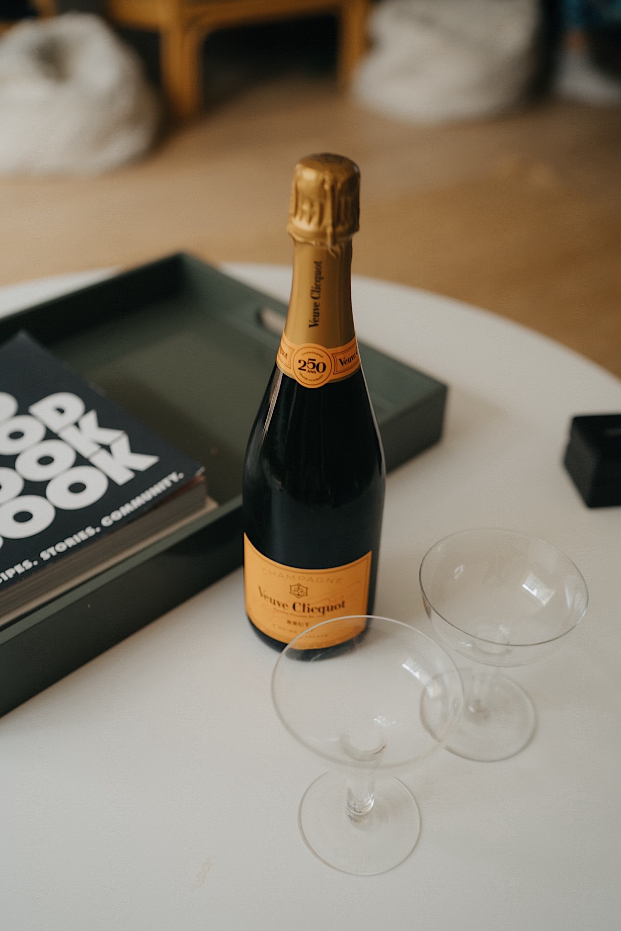 006_champagne-glasshaus-brucke-wedding-melbourne-richmond A bottle of Veuve Clicquot champagne, set up for celebration at a Glasshaus Brucke wedding in Richmond, Melbourne