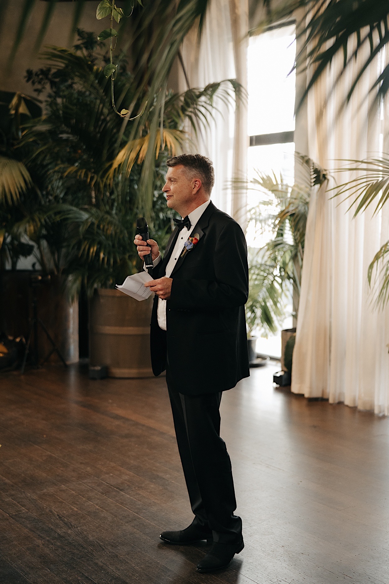 162_speech-glasshaus-brucke-wedding-reception-melbourne Father of the bride giving a speech at a wedding reception at Glasshaus Brucke in Melbourne