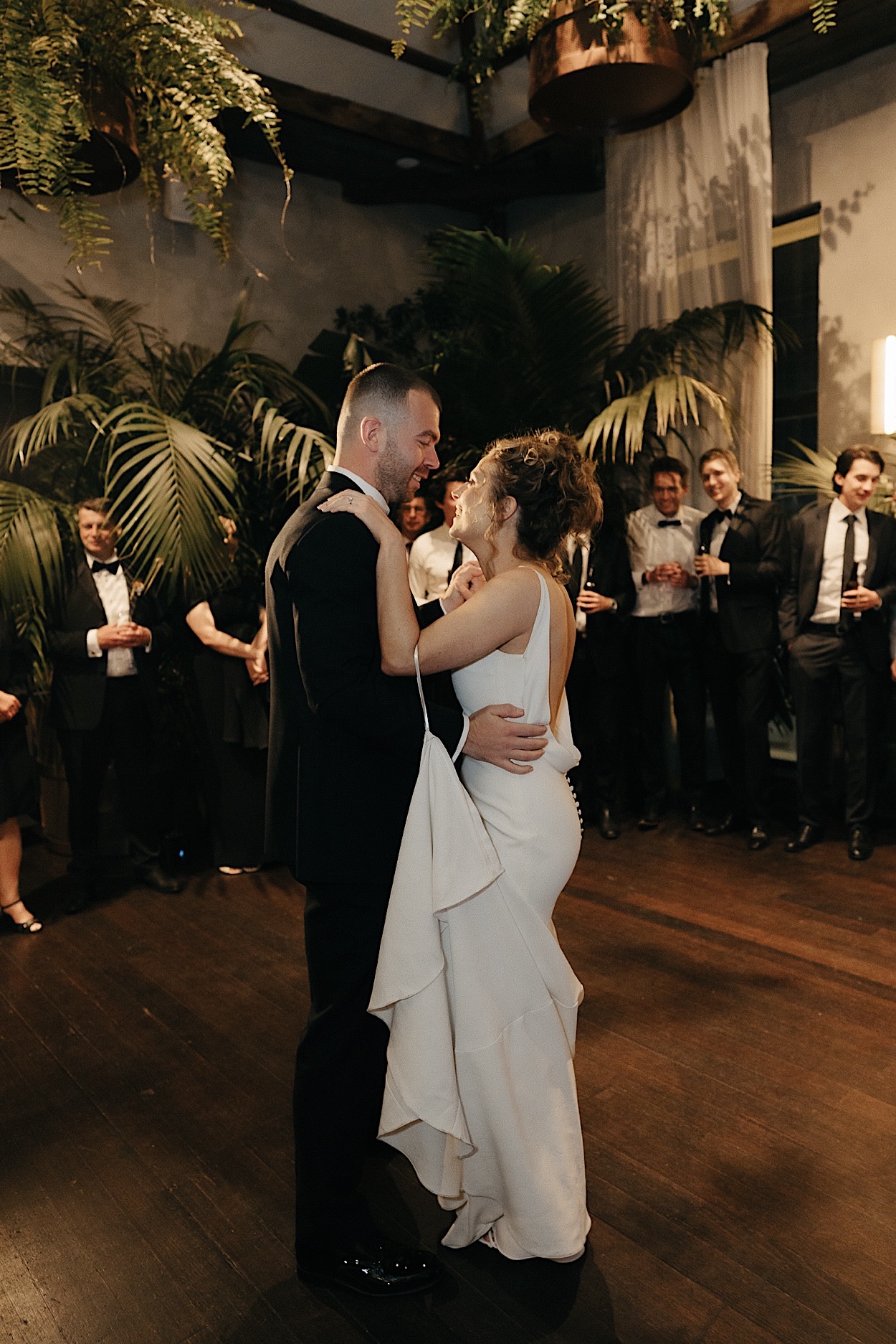 188_first-dance-glasshaus-brucke-melbourne-wedding Bride and groom sharing their first dance at a wedding reception at Glasshaus Brucke in Melbourne