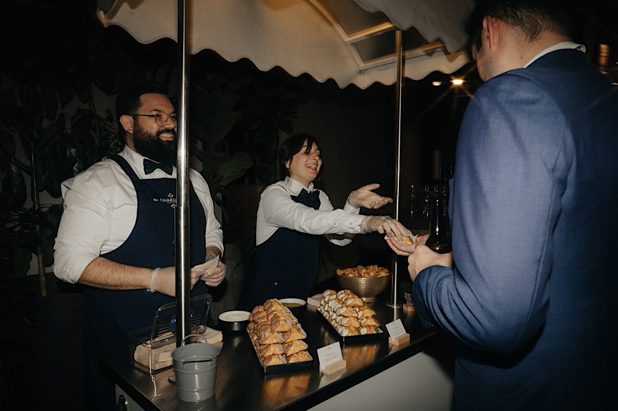 204_cannoli-cart-wedding-reception-glasshaus-brucke-richmond Cannoli cart serving guests at a wedding reception at Glasshaus Brucke in Richmond, Melbourne