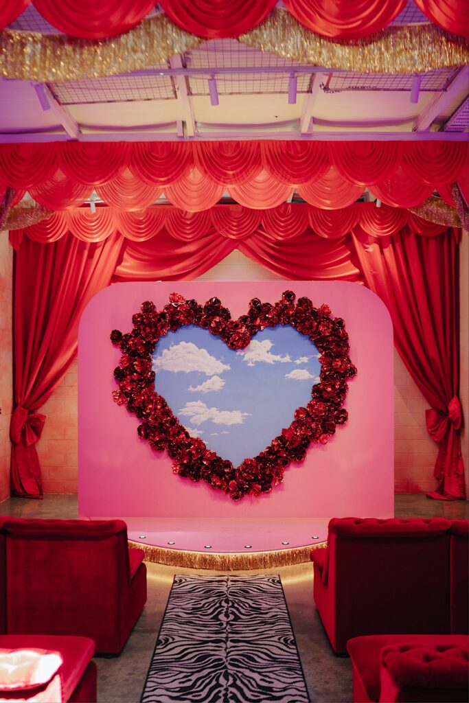 049_wedding-chapel-backdrop-altar-electric-melbourne Colorful floral love heart backdrop at the wedding chapel in Altar Electric, Collingwood, Melbourne