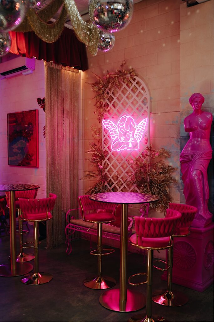 051_vegas-chapel-details-altar-electric-collingwood-melbourne Pink neon sign and bar seats as part of the Vegas chapel details at Altar Electric, Collingwood, Melbourne